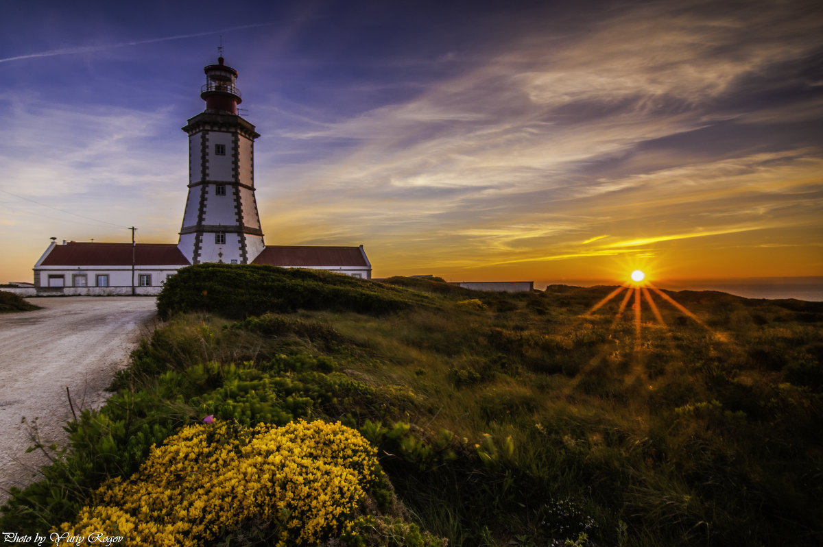 Lighthouse. Cape Espichel. Portugal - Yuriy Rogov