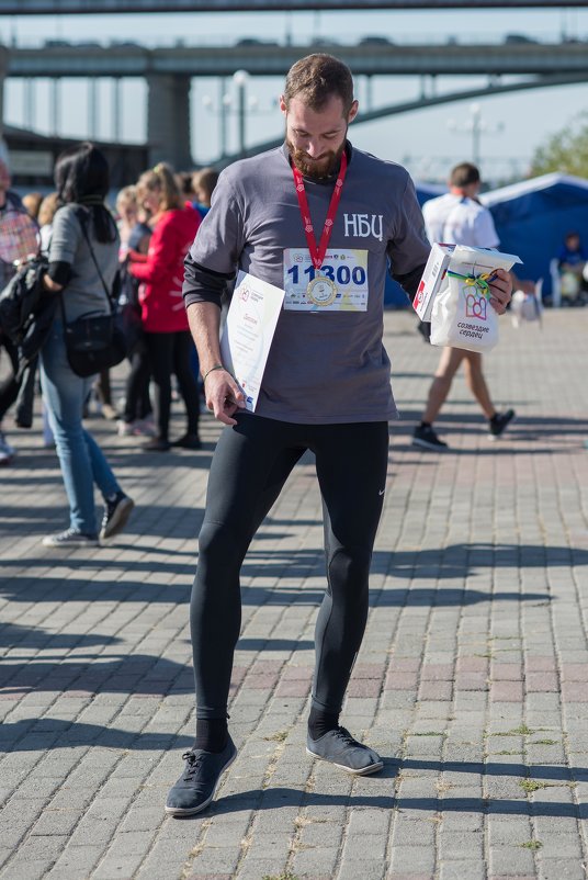Один из победителей забега на 5 км - Дмитрий Пронь