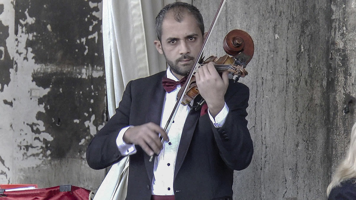 Venezia. Il musicista in un caffè Florian in piazza San Marco. - Игорь Олегович Кравченко