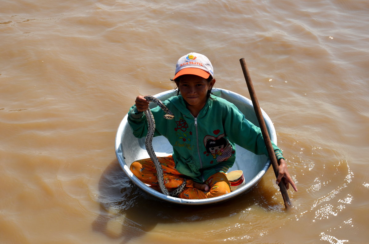 Камбоджа, местный житель озера Тонлесап - Михаил Кандыбин