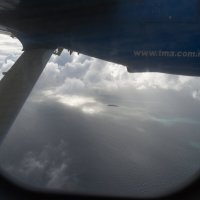 под крылом самолета о чем-то поют...чудесные воды Мальдив.. :: Александр Беляков