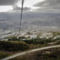 Дождь над городом :: Ольга Протасова