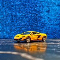 MCLaren 675LT желтый Unistar 9617 с дверями типа «крыло чайки» 1:43 :: Jakob Dick