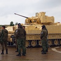 На фоне трофейного Брэдли :: Дмитрий Петренко